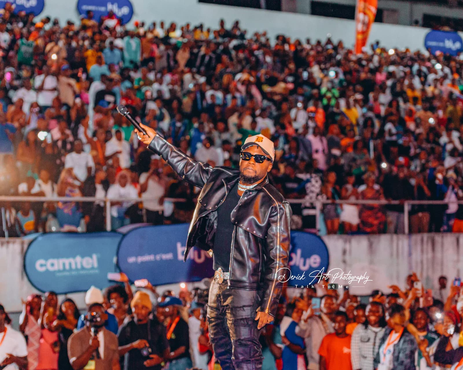 A performer facing the CIMFEST stadium crowd