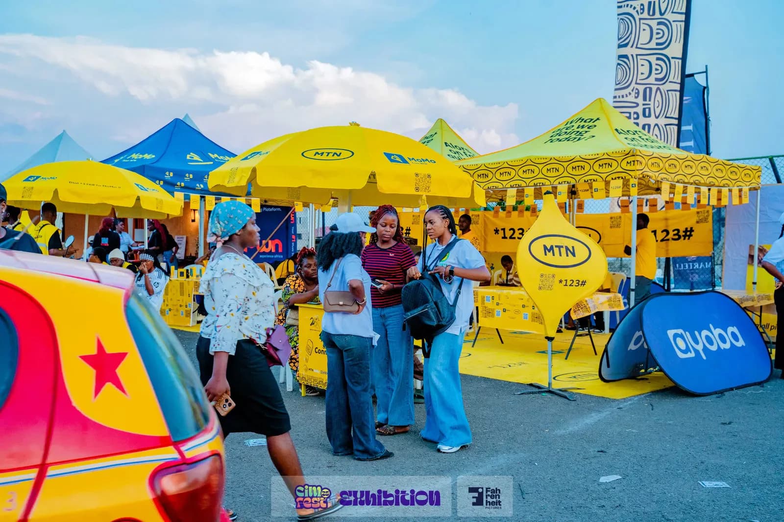 Colourful sponsor tents in the exhibition zone