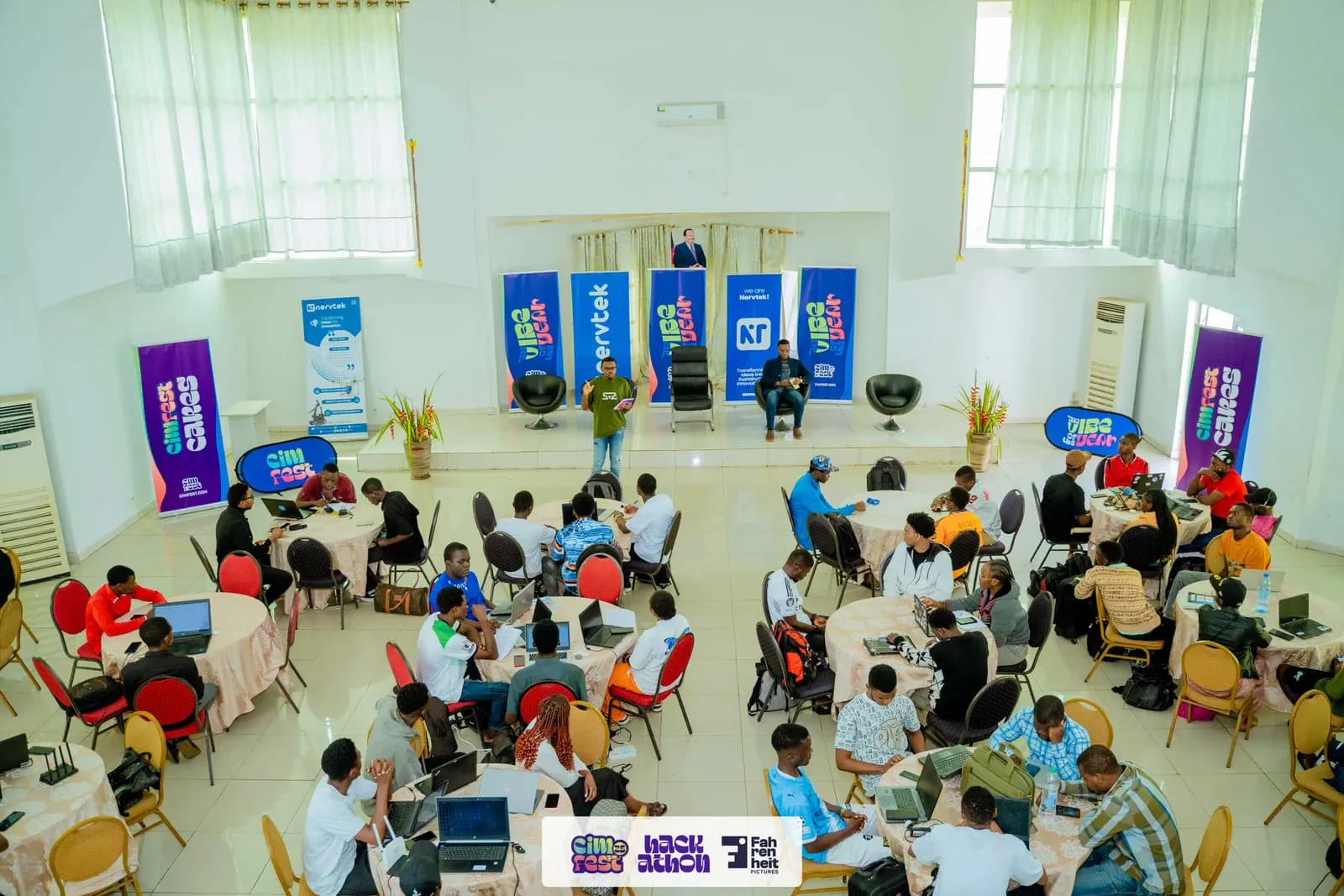 Teams at work during the CIMFEST Hackathon