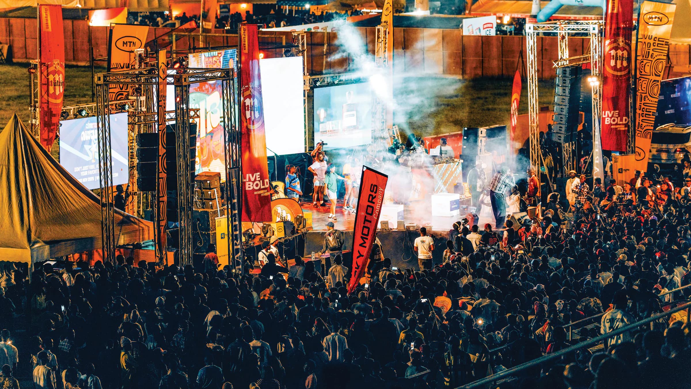 A packed CIMFEST festival crowd at night
